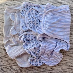 Three Velcro swaddles